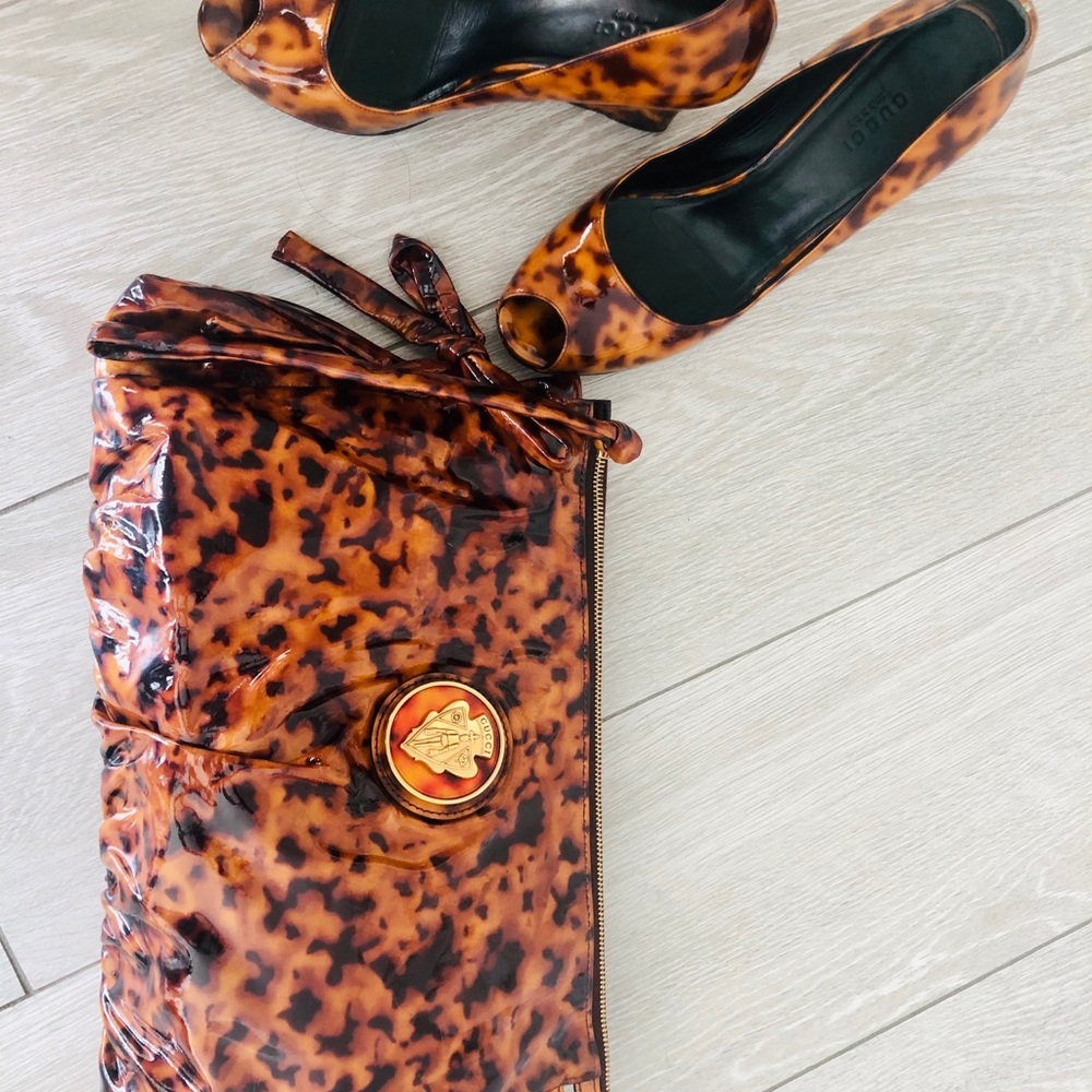 Gucci Patent leather clutch. 12x9”.